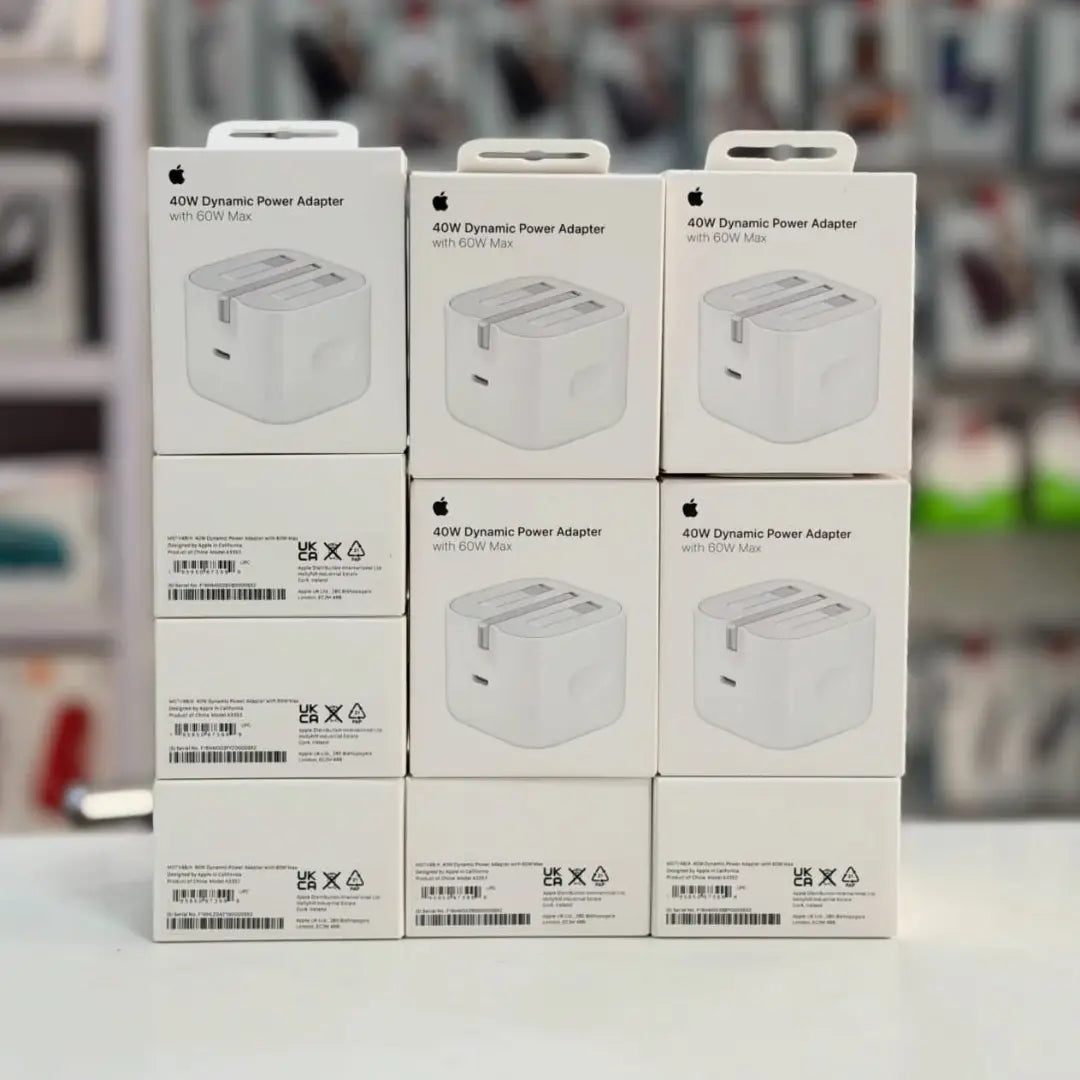 Stack of Apple 40W Dynamic Power Adapter boxes